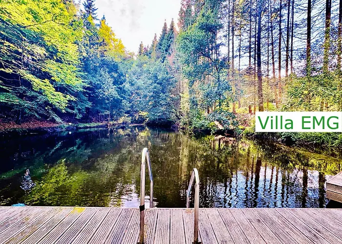 Emg In Alleinlage Mit Privatsee Jacuzzi Und Sauna Fuer Bis Zu 22 Personen Bei Osnabrueck Villa Preussisch Oldendorf